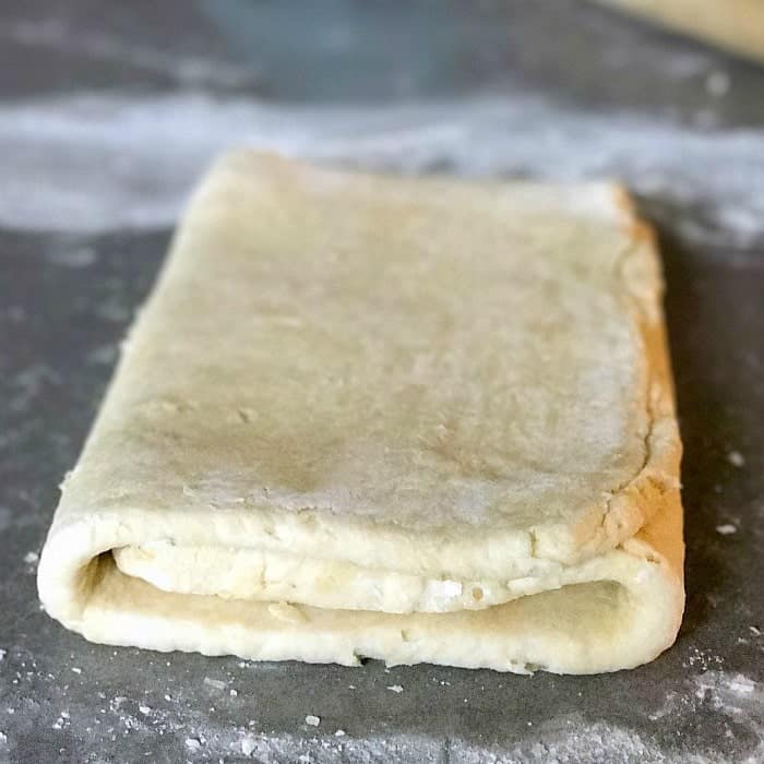 Quick puff pastry bakes up with all of the buttery flakiness of traditional puff pastry, but is ready to use in in under an hour! If you've ever wanted to get your feet wet with making a laminated dough, quick puff pastry is the perfect one to try first! Use this quick puff pastry dough to make a wide variety of sweet and savory creations! 