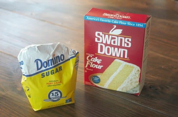 A bag of Domino sugar and a box of Swan's Down cake flour