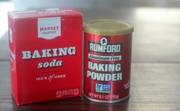 Box of baking soda, jar of baking powder