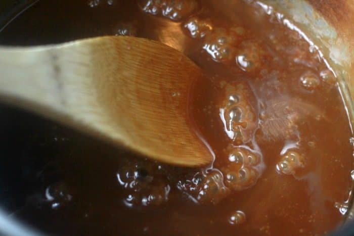 Thickened caramel sauce in a pan